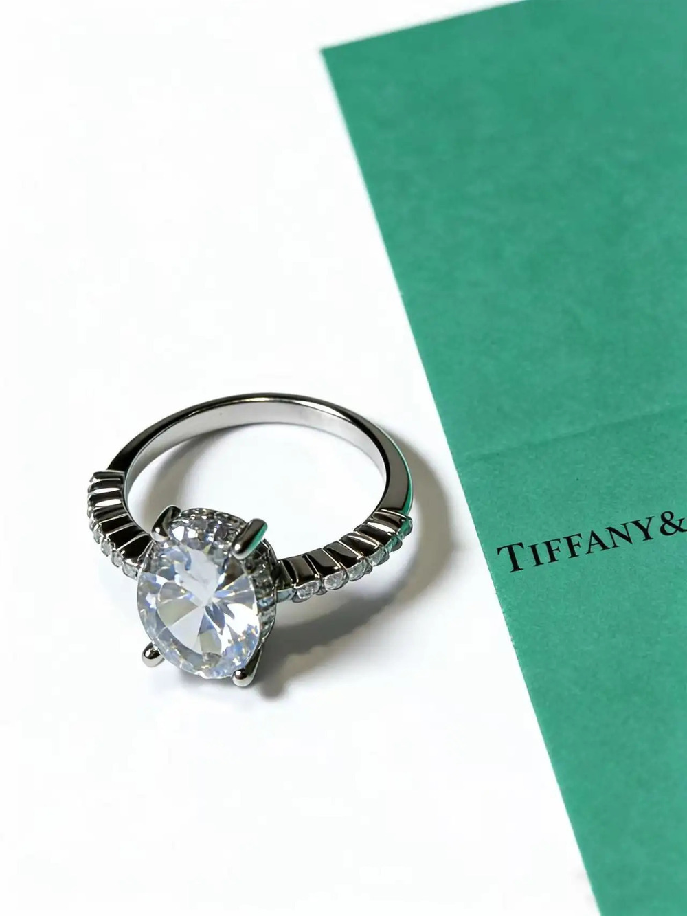 Tiffany & Co. Oval Center Stone and Side Stone Ring